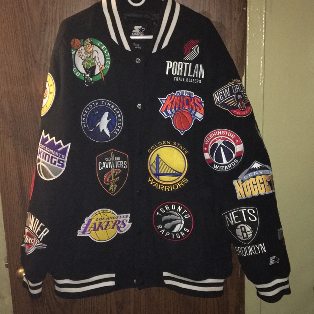 This a black NBA jacket with all 30 teams